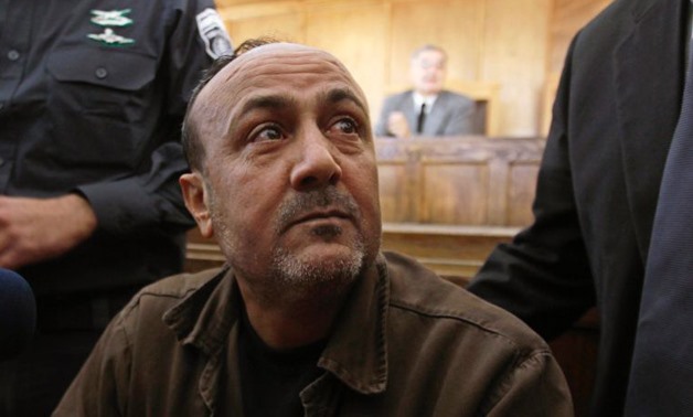 Jailed Fatah leader Marwan Barghouti attends a deliberation at Jerusalem Magistrate's court, on January 25, 2012- Ammar Awad, Reuters