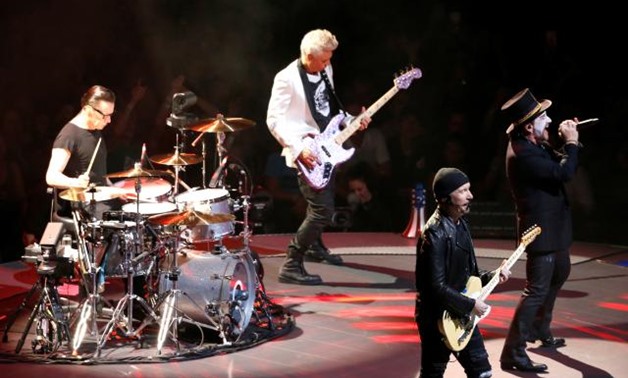 FILE PHOTO: U2 performs during the band's "Experience + Innocence" tour at The Forum in Inglewood, California, U.S., May 16, 2018. REUTERS/Mario Anzuoni.