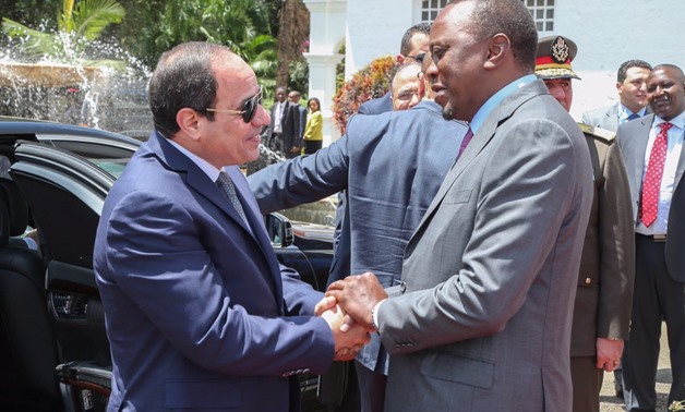 President Abdel Fatah al-Sisi (L) received by his Kenyan counterpart Uhuru Kenyatta in February in Nairobi - Source: Uhuru Kenyatta's official twitter 