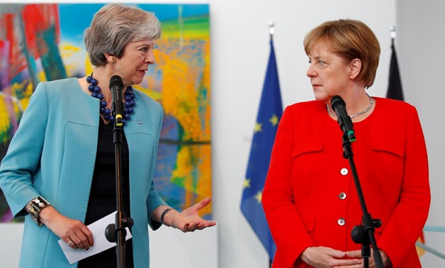 FILE PHOTO: German Chancellor Angela Merkel receives Britain's Prime Minister Theresa May in Berlin, Germany, July 5 2018. REUTERS/Axel Schmidt/File Photo
