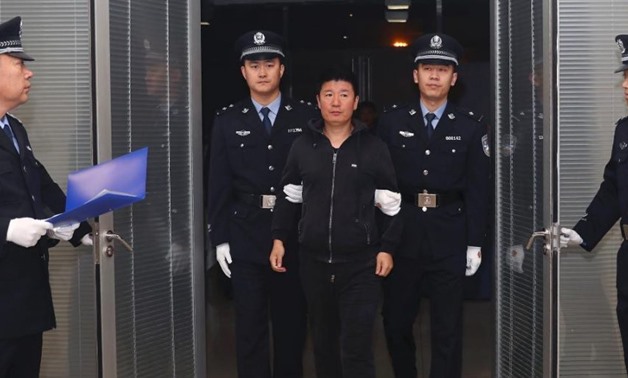Chinese graft fugitive returns from New Zealand to surrender