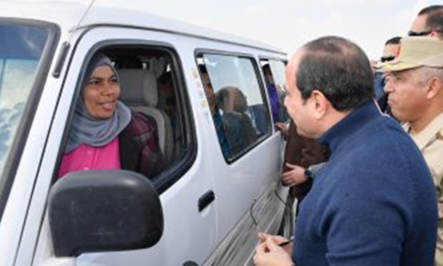 FILE - President Abdel Fatah al-Sisi met with a female minibus driver, Nehmedo Saeed on Thursday, during his tour of Egypt’s New Administrative Capital.
