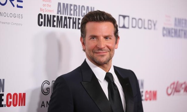 FILE PHOTO: Honoree Bradley Cooper poses at the American Cinematheque Awards in Beverly Hills, California, U.S., November 29, 2018. REUTERS/Danny Moloshok.