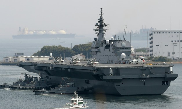 Japan's new five-year defence plan calls for the military to upgrade two existing "helicopter carriers" so that they will also be able to launch fighter jets
