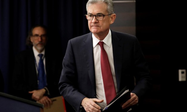 Federal Reserve Board Chairman Jerome Powell arrives at his news conference after a Federal Open Market Committee meeting in Washington, U.S., December 19, 2018. REUTERS/Yuri Gripas

