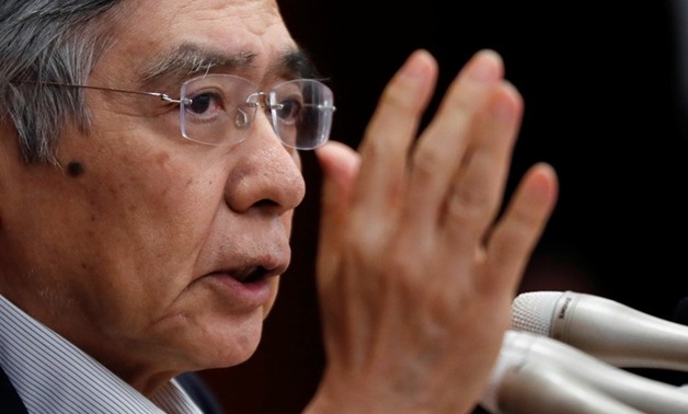Japan's central bank chief signals room to boost stimulus as economic risks rise