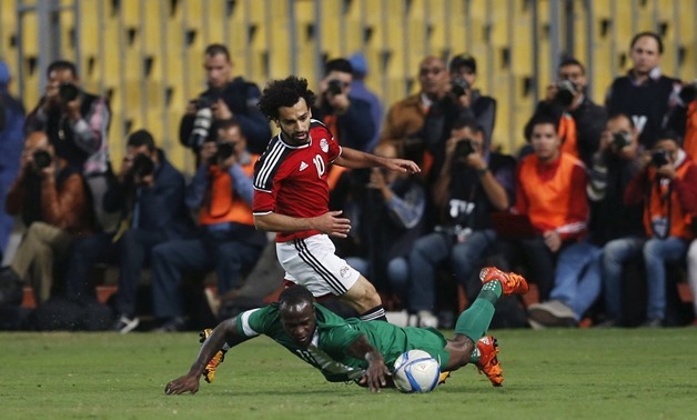 Egypt’s Mohamed Salah and Nigeria’s Victor Moses in action. REUTERS/Amr Abdallah Dalsh