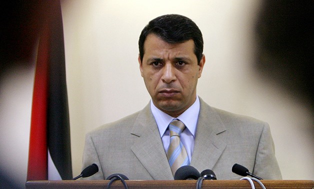 FILE - Mohammed Dahlan speaks to media in the West Bank city of Ramallah, July 5, 2005 - Reuters