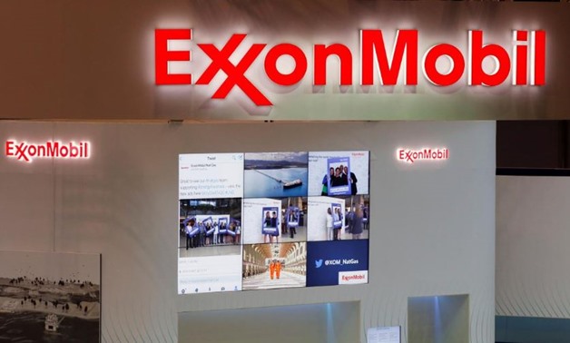 FILE PHOTO: Logos of ExxonMobil are seen in its booth at Gastech, the world's biggest expo for the gas industry, in Chiba, Japan April 4, 2017. REUTERS/Toru Hanai