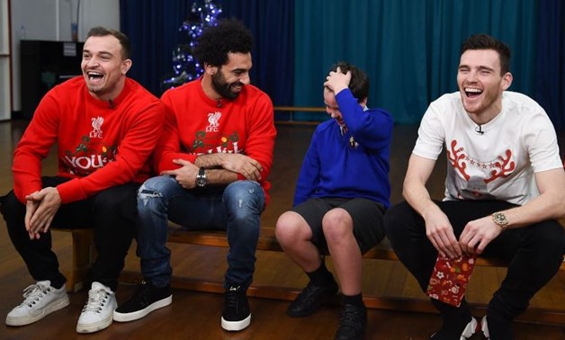 Salah, Shaqiri and Robertson with Liverpool schoolkids - Courtesy of Official Liverpool website
