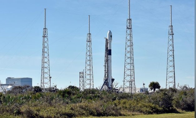 The SpaceX Falcon 9 rocket, scheduled to launch a U.S. Air Force navigation satellite, sits on Launch Complex 40 after the launch was postponed after an abort procedure was triggered by the onboard flight computer, December 18, 2018. REUTERS/ File Photo