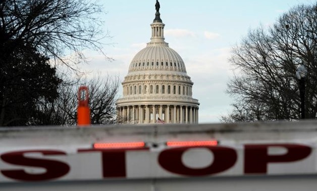 A security barricade is placed in front of the U.S. Capitol on the first day of a partial federal government shutdown in Washington, U.S., December 22, 2018. REUTERS/Joshua Roberts
