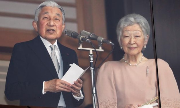 Japan emperor draws huge birthday crowd before abdication next year - Reuters.