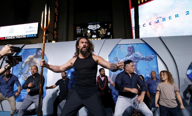 Cast member Jason Momoa performs a haka dance at the premiere for "Aquaman" in Los Angeles, California, U.S., December 12, 2018. REUTERS/Mario Anzuoni/File Photo
