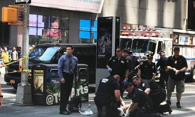 First responders are assisting injured pedestrians after a vehicle struck pedestrians on a sidewalk in Times Square in New York, U.S. - REUTERS/Jeremy Schultz