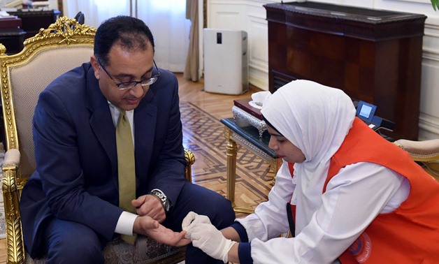 Prime Minister Mostafa Madbouly tested for hepatitis C as part of a presidential initiative - Egypt Today/Soliman al-Eteify