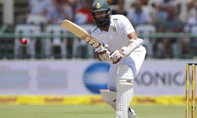 South Africa's Hashim Amla plays a shot during the second cricket test match against England in Cape Town, South Africa, January 4, 2016. REUTERS/Mike Hutchings
