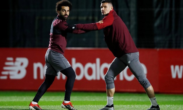 Soccer Football - Champions League - Liverpool Training - Melwood, Liverpool, Britain - December 10, 2018 Liverpool's Mohamed Salah and Dejan Lovren during training Action Images via Reuters/Carl Recine
