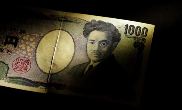 A Japan Yen note is seen in this June 22, 2017 illustration photo. REUTERS/Thomas White/Illustration
