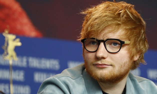 FILE PHOTO: Ed Sheeran attends a news conference to promote the movie Songwriter at the 68th Berlinale International Film Festival in Berlin, Germany, February 23, 2018. REUTERS/Fabrizio Bensch