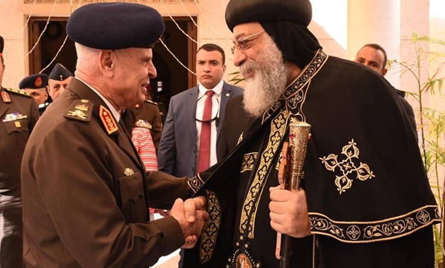 Egypt's Defense Minister Mohamed Zaki (L) and Pope Tawadros II of Alexandria (R) - Press Photo