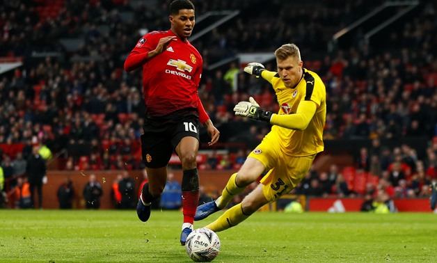 Soccer Football - FA Cup Third Round - Manchester United v Reading - Old Trafford, Manchester, Britain - January 5, 2019 Manchester United's Marcus Rashford in action with Reading's Anssi Jaakkola Action Images via Reuters/Jason Cairnduff
