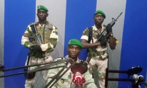 A still image taken from a video posted on January 7, 2019, shows military officers giving a statement from a radio station in Libreville, Gabon. HANDOUT via Reuters TV ATTENTION EDITORS