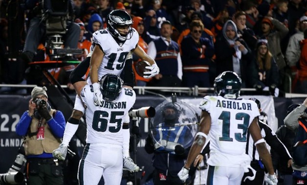 Philadelphia's Golden Tate celebrates what proved to be the winning touchdown catch in a 16-15 Eagles victory Sunday at Chicago / GETTY IMAGES NORTH AMERICA/AFP / Dylan Buell

