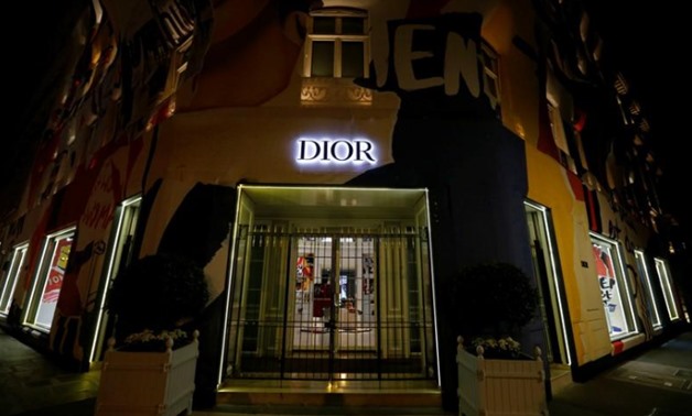 FILE PHOTO: The Dior logo is seen on the facade of a shop in Paris, France, August 5, 2018. Picture taken August 5, 2018. REUTERS/Regis Duvignau