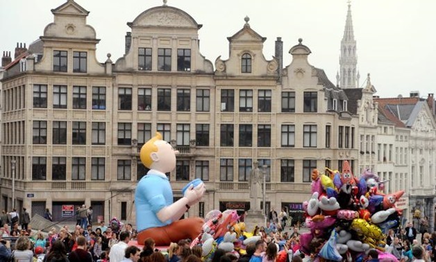 FILE PHOTO: A Tintin balloon float is seen in Albertine Square during Balloon's Day Parade in Brussels September 6, 2014. REUTERS/Eric Vidal

