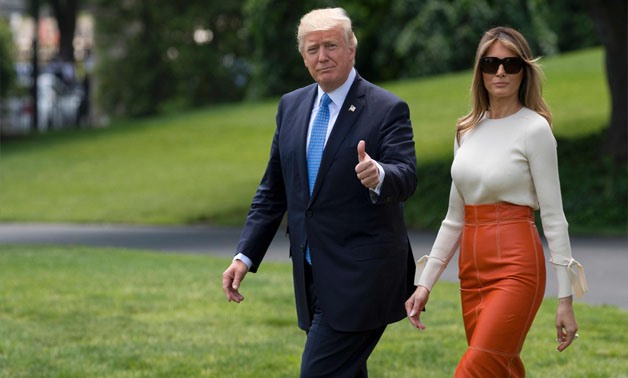 U.S. President Donald Trump (L) and First Lady Melania (R)