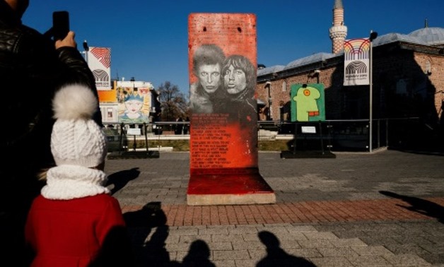 Visitors were able to see fragments of the Berlin wall covered in "street art" AFP

