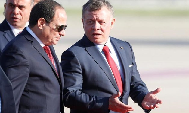 FILE - Jordan’s King Abdallah II walks with Egypt’s President Abdel Fatah al-Sisi in Amman, Jordan – Reuters