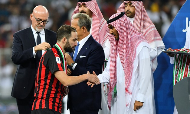 Soccer Football - Italian Super Cup - Juventus v AC Milan - King Abdullah Sports City, Jeddah, Saudi Arabia - January 16, 2019 AC Milan's Gonzalo Higuain looks on as he receives a medal after the match REUTERS/Waleed Ali