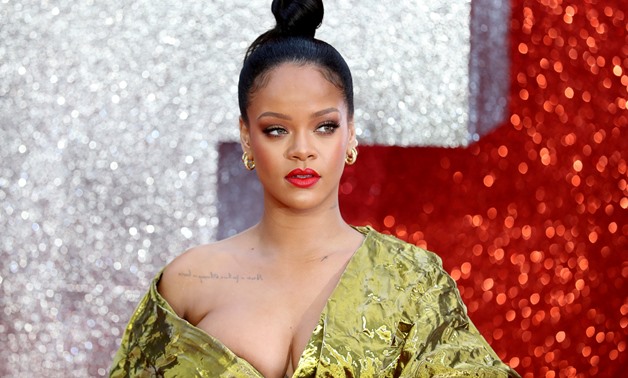 FILE PHOTO: Cast member Rihanna poses for pictures on the red carpet for the European premiere of Ocean's 8 in London, Britain June 13, 2018. REUTERS/Simon Dawson/File Photo