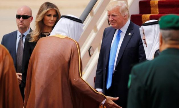 Saudi Arabia's King Salman bin Abdulaziz Al Saud welcomes U.S. President Donald Trump and first lady Melania Trump during a reception ceremony in Riyadh, Saudi Arabia, May 20, 2017 - REUTERS
