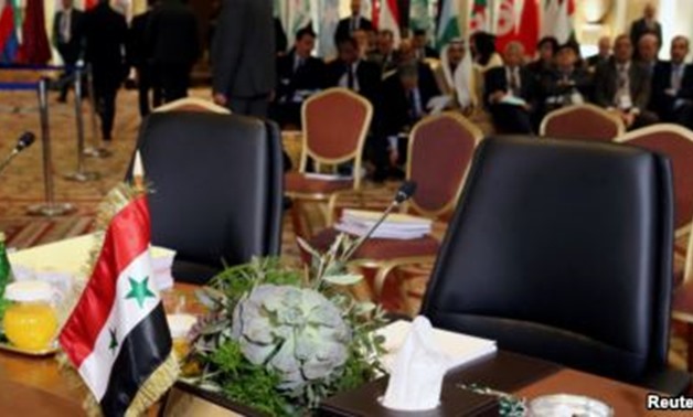 The empty seat of Syria is seen during a pre Arab Economic and Social Development summit

