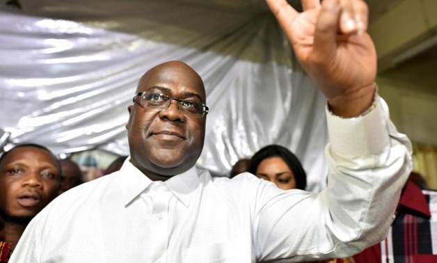 Felix Tshisekedi, leader of the Congolese main opposition party, the Union for Democracy and Social Progress who was announced as the winner of the presidential elections gestures to his supporters at the party headquarters in Kinshasa, Democratic Republi