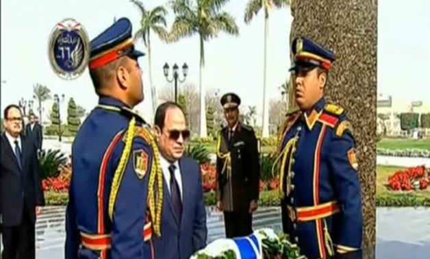 President Abdel Fatah al-Sisi lays flowers at the Police Memorial in Cairo Jan. 24, 2018 - Youtube still
