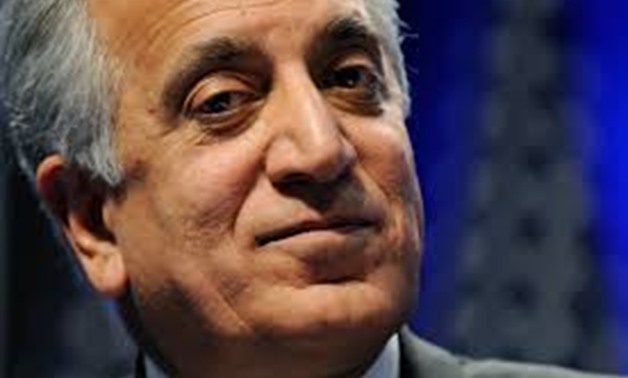 FILE PHOTO: Zalmay Khalilzad, former U.S. ambassador to Afghanistan, Iraq and the United Nations, listens to speakers during a panel discussion on Afghanistan at the Conservative Political Action conference (CPAC) in Washington, February 12, 2011. REUTERS