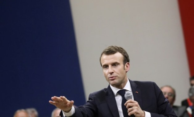 President Emmanuel Macron is holding dozens of town hall-style debates across France in a bid to defuse "yellow vest" anger POOL/AFP/File
