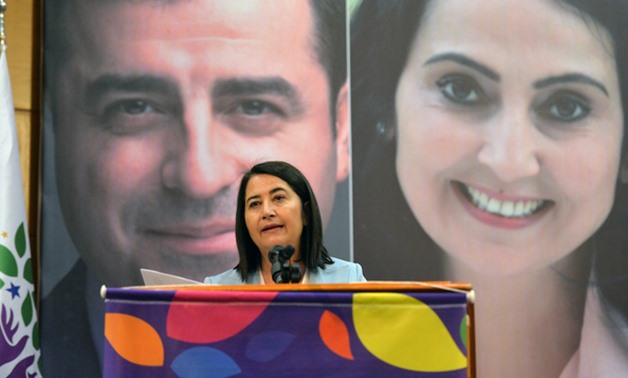 Kemalbay addressed HDP delegates in Ankara in front of images of the party's jailed leaders - AFP