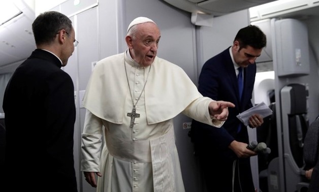 Pope Francis gestures as he speaks during a news conference aboard a plane on the way back from Panama to Rome, Italy January 27, 2019. Alessandra Tarantino/Pool via REUTERS
