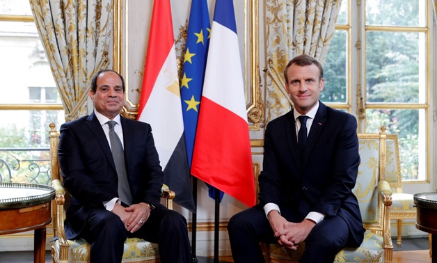 FILE PHOTO: French President Emmanuel Macron meets with Egyptian President Abdel Fattah al-Sisi at the Elysee Palace, in Paris, France, October 24, 2017. REUTERS/Philippe Wojazer/File Photo

