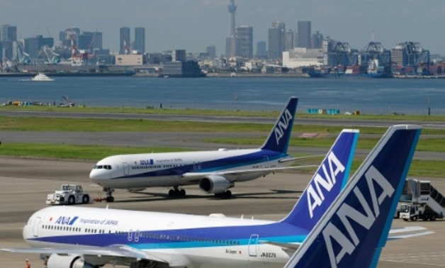 ANA Holdings said it would buy 30 Boeing and 18 Airbus planes, citing growing demand in the region and increased inbound tourism to Japan AFP/File
