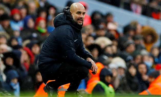 FILE PHOTO: Soccer Football - FA Cup Fourth Round - Manchester City v Burnley - Etihad Stadium, Manchester, Britain - January 26, 2019 Manchester City manager Pep Guardiola looks on during the match Action Images via Reuters/Jason Cairnduff/File Photo
