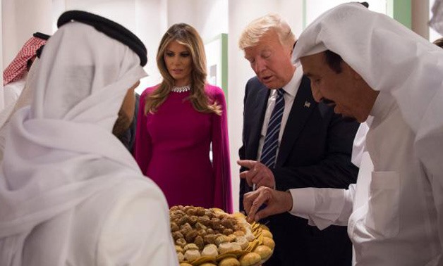 U.S. President Donald Trump and first lady Melania Trump are welcomed by Saudi Arabia's King Salman bin Abdulaziz Al Saud at Al Murabba - REUTERS