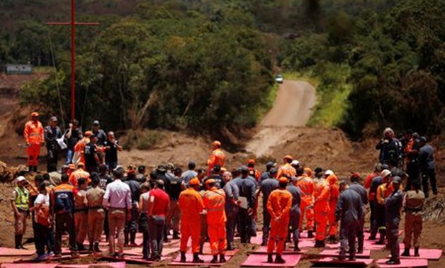 Rescue workers attend a mass for victims victims of a collapsed tailings dam owned by Brazilian mining company Vale SA, in Brumadinho, Brazil February 1, 2019. REUTERS/Adriano Machado
