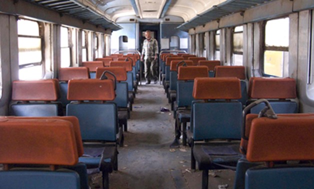 A stranded passenger walks inside an empty train carriage during strike by drivers at the main train station in Cairo, April 7, 2013 (Photo: Reuters)
