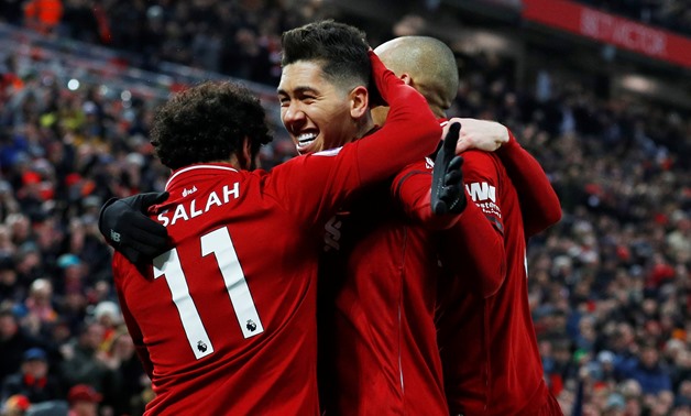 Soccer Football - Premier League - Liverpool v Crystal Palace - Anfield, Liverpool, Britain - January 19, 2019 Liverpool's Roberto Firmino celebrates scoring their second goal with Mohamed Salah and Fabinho REUTERS/Phil Noble